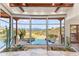 Beautiful wall of windows with views of the pool and the surrounding mountains and desert at 15504 E Firerock Country Club Dr, Fountain Hills, AZ 85268