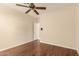 Bedroom with ceiling fan and hardwood floors at 15602 N 19Th St, Phoenix, AZ 85022