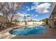 Inviting backyard pool with beautiful desert landscaping, perfect for relaxation and outdoor entertaining at 15602 N 19Th St, Phoenix, AZ 85022