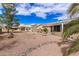 Extensive desert backyard with multiple patio areas, designed for relaxation at 16019 W Heritage Dr, Sun City West, AZ 85375