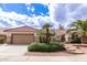 Charming single-story home with desert landscaping, a tiled roof, and a spacious two-car garage at 16019 W Heritage Dr, Sun City West, AZ 85375