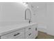 White bathroom features modern vanity with a black faucet and an arched mirror above at 1743 N Dresden --, Mesa, AZ 85203