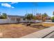 Traditional single-story home with a xeriscaped front yard and a white picket fence at 1743 N Dresden --, Mesa, AZ 85203