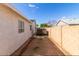 Side yard of the home leading towards backyard with block wall and trailer at 1743 N Dresden --, Mesa, AZ 85203