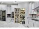 View of a kitchen, emphasizing the pantry at 17530 W Oberlin Way, Surprise, AZ 85387