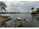 Scenic pond view with a variety of trees and plants at 17846 W Fairview St, Goodyear, AZ 85338