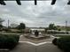 View of the water feature with a lake view and meticulously manicured landscaping at 17846 W Fairview St, Goodyear, AZ 85338