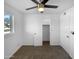 Bedroom with a closet, door, and view to the outdoors through the window at 1801 W 5Th Pl, Mesa, AZ 85201