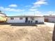 Charming single-story home with a fresh white exterior, dark roof, and minimalist landscaping at 1801 W 5Th Pl, Mesa, AZ 85201