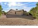 Exterior view of the home with desert landscaping featuring low maintenance rock at 1873 Leisure World --, Mesa, AZ 85206