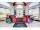 Reception area with golf bags and accessories for Heron Lakes community in a well lit stylish lobby at 1873 Leisure World --, Mesa, AZ 85206