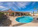 Sparkling pool with patio and covered outdoor seating, ideal for enjoying sunny days at 1908 E Beck Ln, Phoenix, AZ 85022