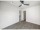 Bedroom featuring tile floor, white trim, and a view to the adjacent room at 1911 W Kimberly Way, Phoenix, AZ 85027