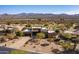 Stunning desert home featuring beautiful landscaping, a private driveway, and picturesque mountain views at 19131 E Tonto Verde Dr, Rio Verde, AZ 85263