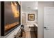 Elegant bathroom with a tub, shower, vanity, neutral colors and decorative artwork at 19700 N 76Th St # 1061, Scottsdale, AZ 85255