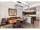 Elegant dining area features a modern chandelier and connects to the kitchen at 19700 N 76Th St # 1061, Scottsdale, AZ 85255