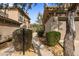 Exterior view showcasing a desert landscaped walkway leading to the home's entrance at 19700 N 76Th St # 1061, Scottsdale, AZ 85255