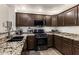 Fully equipped kitchen with stainless steel appliances and ample cabinet space at 19700 N 76Th St # 1061, Scottsdale, AZ 85255