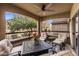 Outdoor patio with comfortable seating, metal table and serene outdoor views at 19700 N 76Th St # 1061, Scottsdale, AZ 85255