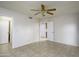 Spacious bedroom featuring neutral walls, ceiling fan, and tiled flooring at 2064 S Farnsworth Dr # 43, Mesa, AZ 85209