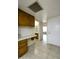 Hallway view featuring tile floors and white walls leading to bedrooms and bathroom at 2064 S Farnsworth Dr # 43, Mesa, AZ 85209