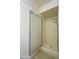 An enclosed shower with tiled walls at 2064 S Farnsworth Dr # 43, Mesa, AZ 85209