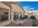 Backyard patio is perfect for entertaining with an outdoor dining set and grill at 2101 S Meridian Rd # 176, Apache Junction, AZ 85120