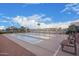 Shuffleboard court area with benches, providing a fun and relaxing community activity at 2101 S Meridian Rd # 176, Apache Junction, AZ 85120