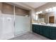 Bathroom featuring a glass shower and a double sink vanity with neutral colors at 22465 E Via Del Verde --, Queen Creek, AZ 85142