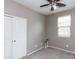 A cozy bedroom featuring a ceiling fan, carpet, and a window for natural light at 22465 E Via Del Verde --, Queen Creek, AZ 85142