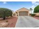 Charming single-story home with a well-maintained front yard, desert landscaping, and attached garage at 22524 N San Ramon Dr, Sun City West, AZ 85375