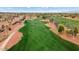 Scenic golf course view featuring lush green fairways, mature trees, and a beautiful desert community at 22524 N San Ramon Dr, Sun City West, AZ 85375