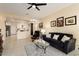 Sunlit living room featuring an open floor plan and comfortable seating at 22524 N San Ramon Dr, Sun City West, AZ 85375