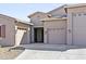 Attractive single-story home with a three-car garage and easy-care desert landscaping at 24847 N 175Th Dr, Surprise, AZ 85387