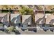 Aerial view of homes featuring well-maintained yards and neutral tile roofs at 2502 S 90Th Gln, Tolleson, AZ 85353