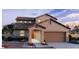 Stunning two-story home with a two-car garage and well-maintained landscaping at 25324 W Bowker St, Buckeye, AZ 85326