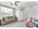 Cozy living room featuring tile flooring and natural light at 256 N Jesse St, Chandler, AZ 85225