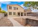 Exterior view of home featuring backyard, patio, and tan stucco at 28282 N Castle Rock Dr, San Tan Valley, AZ 85143