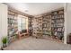 Reading room featuring an extensive built in library and ladder at 28282 N Castle Rock Dr, San Tan Valley, AZ 85143