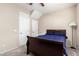 Comfortable bedroom featuring a dark wood bed frame and neutral walls at 32 W Desert Vista Trl, San Tan Valley, AZ 85143