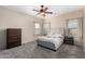 Bedroom with neutral colors and a ceiling fan at 32 W Desert Vista Trl, San Tan Valley, AZ 85143