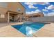 Backyard pool featuring a patio area, tall fence, and basketball hoop for outdoor entertainment at 32 W Desert Vista Trl, San Tan Valley, AZ 85143