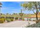 Scenic backyard view of the golf course and pond, complete with desert landscaping at 33575 N Dove Lakes Dr # 1038, Cave Creek, AZ 85331