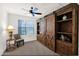 Bedroom showcasing a custom built-in with sliding barn doors and ample storage at 33575 N Dove Lakes Dr # 1038, Cave Creek, AZ 85331