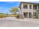 Charming condo with stone accents, stairs to a private balcony and landscaping at 33575 N Dove Lakes Dr # 1038, Cave Creek, AZ 85331