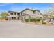 Beautiful two-story condo with desert landscaping, attached garages and private balconies at 33575 N Dove Lakes Dr # 1038, Cave Creek, AZ 85331