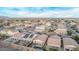 A community aerial shot highlights homes featuring solar panels, outdoor living, and sparkling pools at 38208 N La Grange Ln, San Tan Valley, AZ 85140