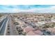 A scenic aerial shot shows residences equipped with solar and pool installations, set against a mountain view at 38208 N La Grange Ln, San Tan Valley, AZ 85140