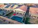 Aerial view of a private backyard oasis with a refreshing pool and covered patio at 38208 N La Grange Ln, San Tan Valley, AZ 85140