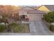 Charming single-story home with manicured front lawn and inviting curb appeal at 38208 N La Grange Ln, San Tan Valley, AZ 85140